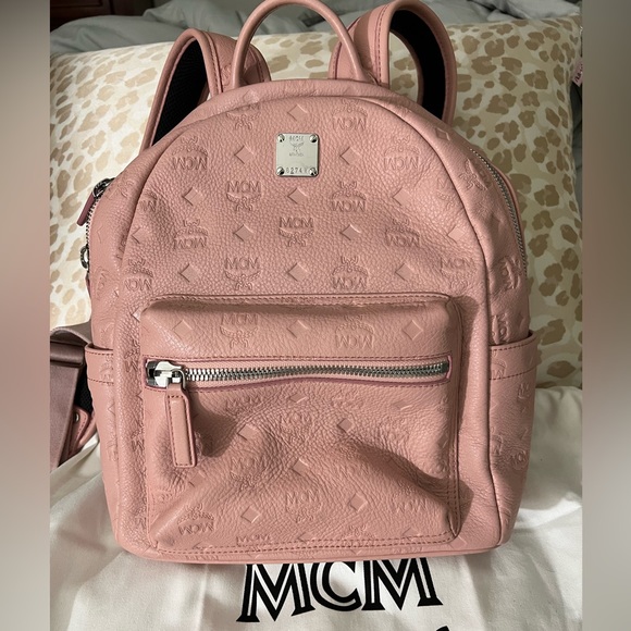 MCM Handbags - Authentic, lightly used pink MCM backpack 10x12x4